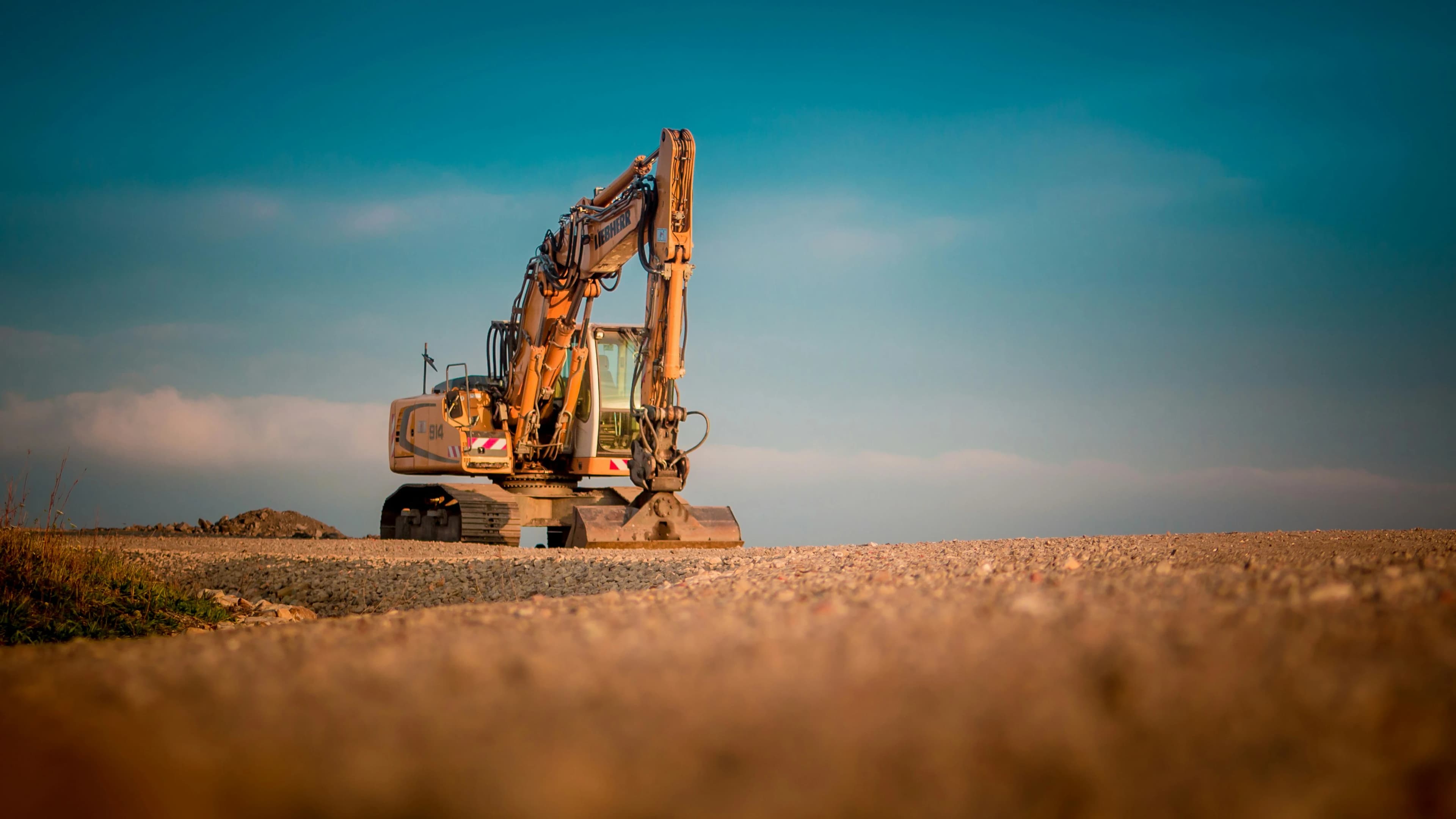 Excavation and site-work — bulldozer grading earth on a coastal construction site